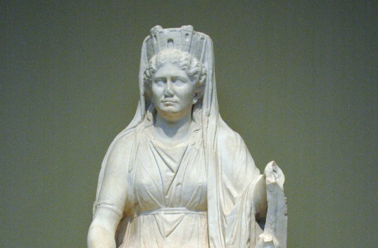 Worn statue of Cybele in robes