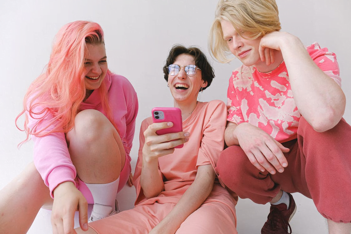 Three Friends in Pink Clothes, Laughing 