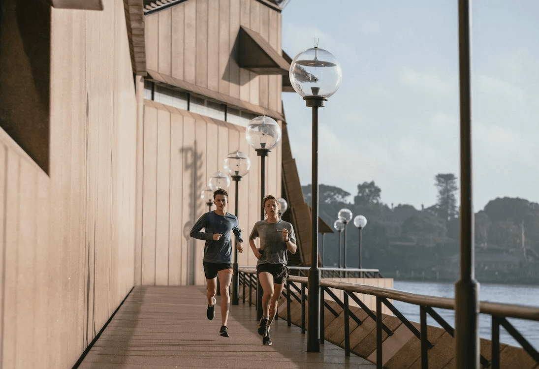 man and woman jogging