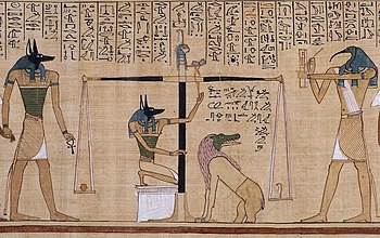 An ancient Egyptian image of the Judgment of Osiris ritual taking place.