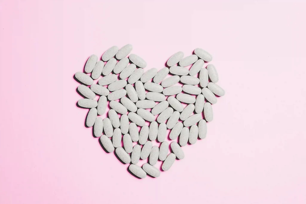 medicine pills in a heart shape
